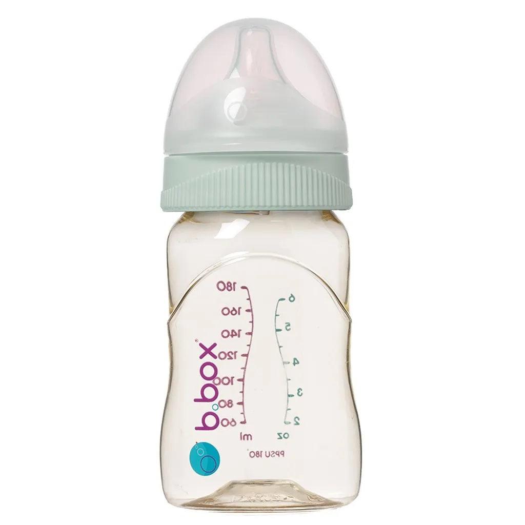 B. Boîte: bouteille d'alimentation pour bébé avec de la sucette 180 ml