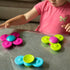 Tauku smadzeņu rotaļlietas: Whirly Squigz vērpjot piesūceknes