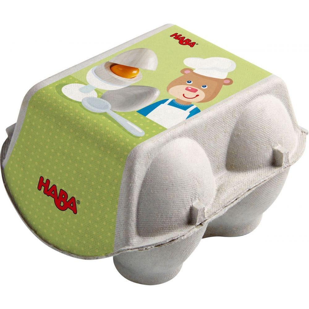 Haba: wooden eggs in a stamping