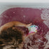 Mini-U: Bath Ball formant une étoile de tourbillon coloré