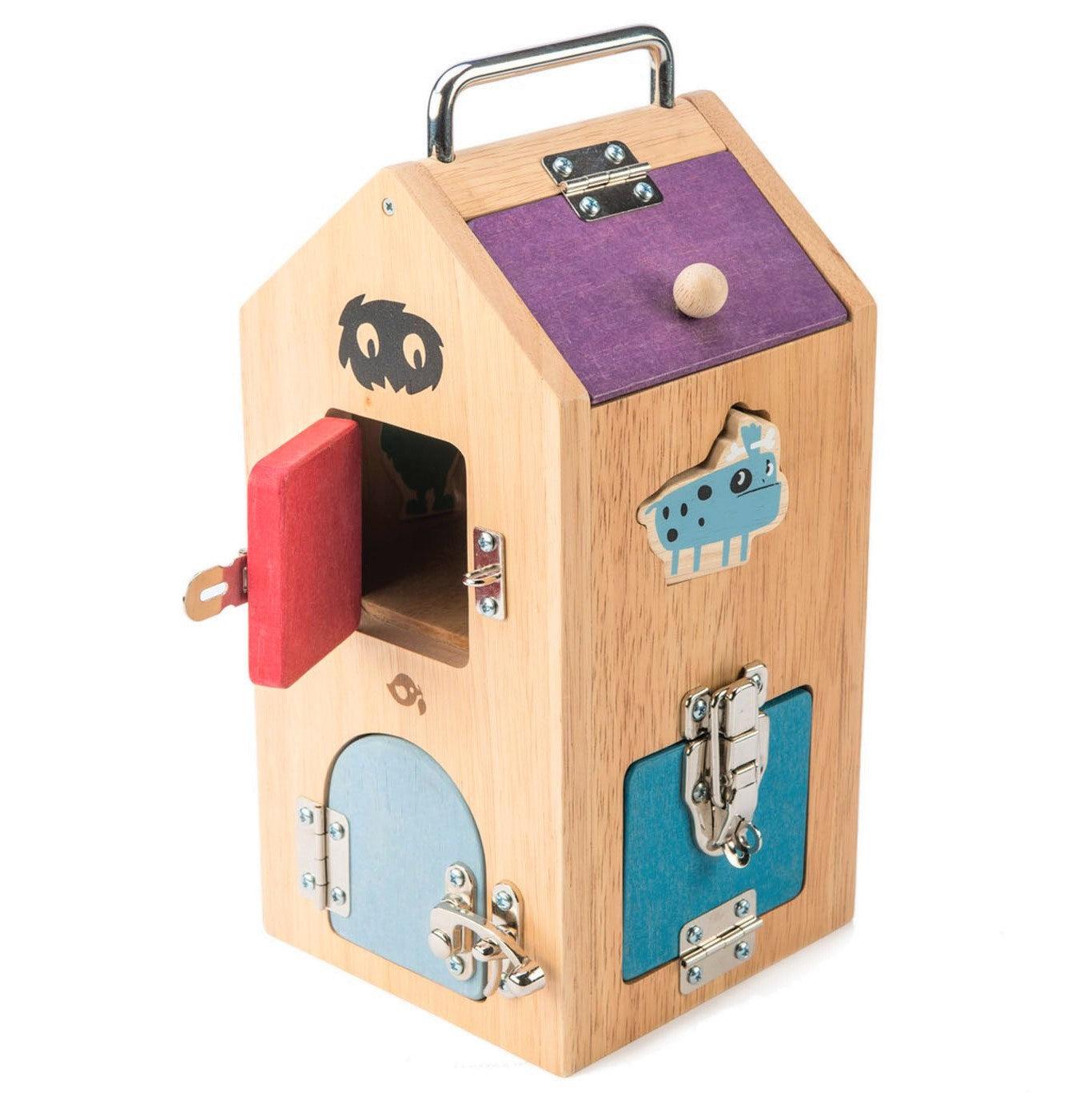 Tender Leaf Toys: Monster Lock Box manipulerende hus med låse