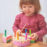 Jucării cu frunze tandre: tort de naștere curcubeu
