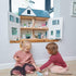 Juguetes de hoja tiernos: casa de muñecas de cola de mochila de tres pisos