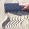 Zsilt: lopata s višenamjenskim lopatom pijeska